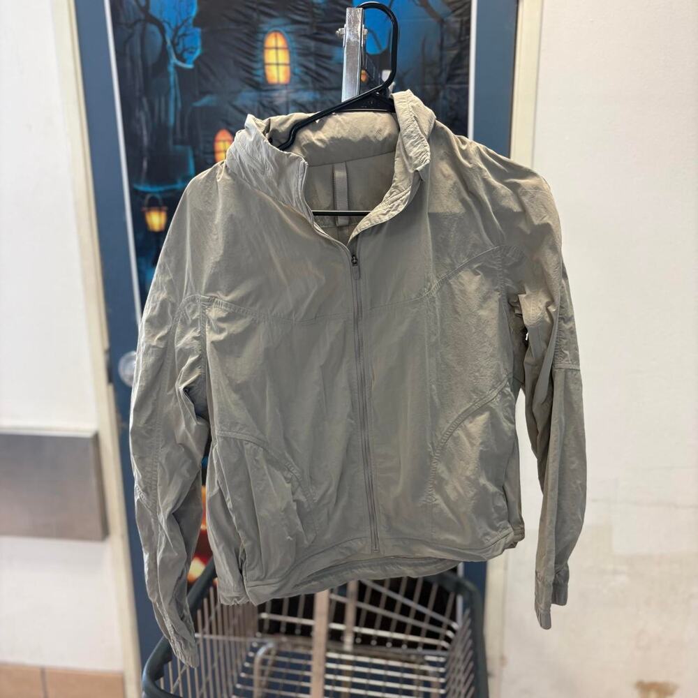 Grey lightweight windbreaker jacket with